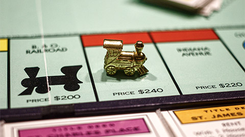 A close up of a Monopoly board